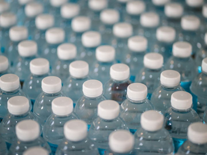 PET stands for polyethylene terephthalate, a common kind of plastic used in the beverage industry.